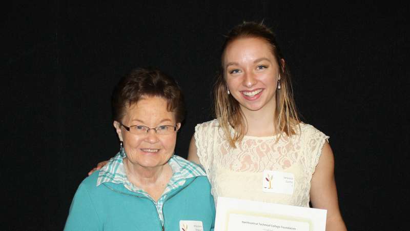 A student receives the Beth Ferrel Memorial Scholarship