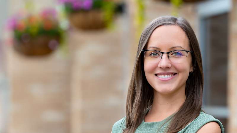 Emma Pinter outside the Wausau Campus building