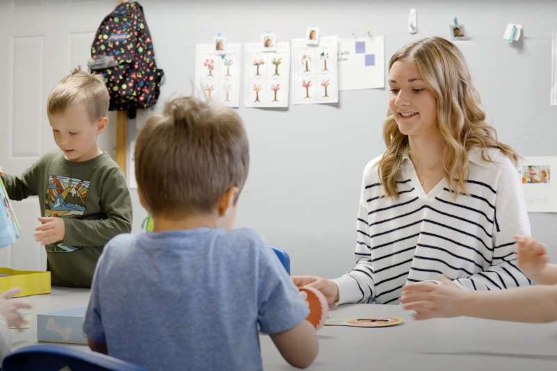 Youth Apprentice Bryn Schroeder working with students in the Early Childhood Education Pathway.